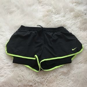 Black and green Nike shorts